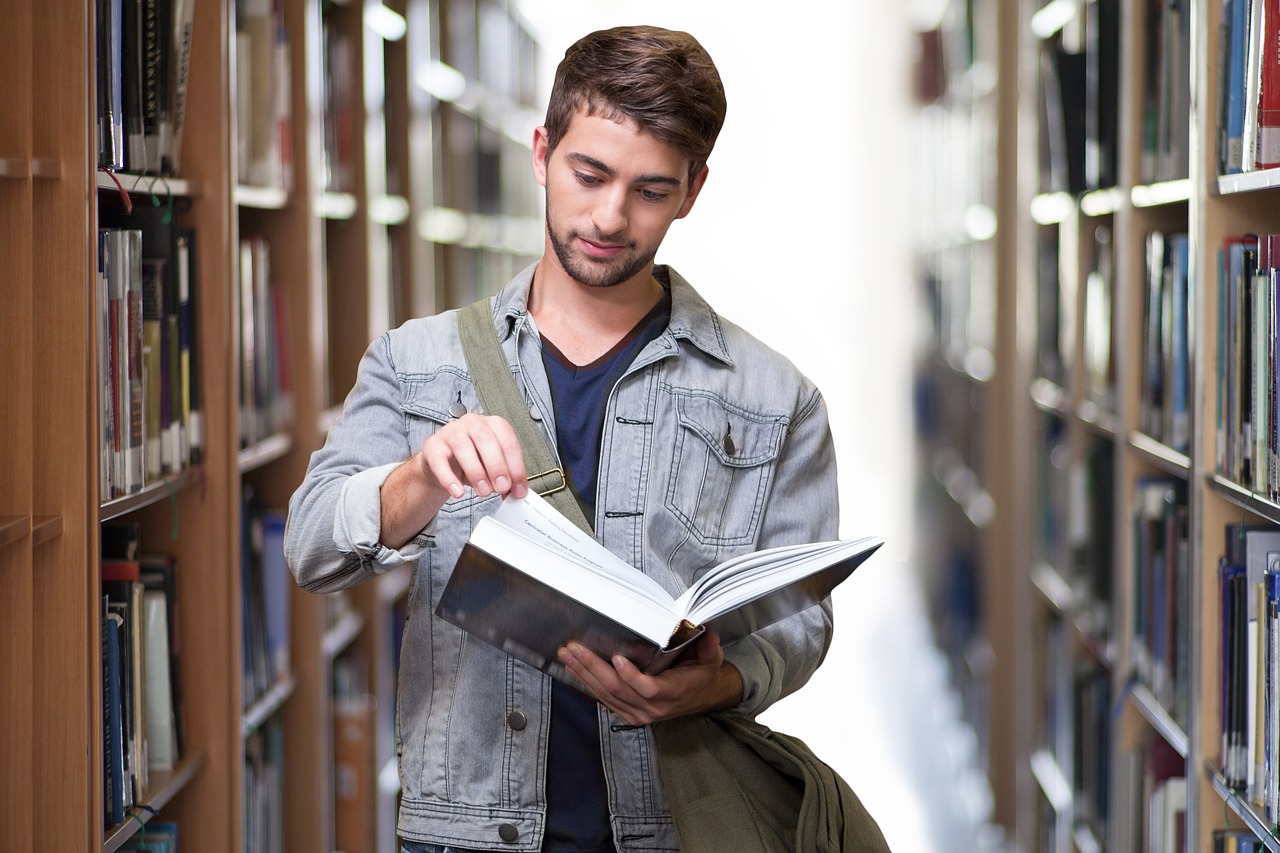 college student, library, man-3500990.jpg